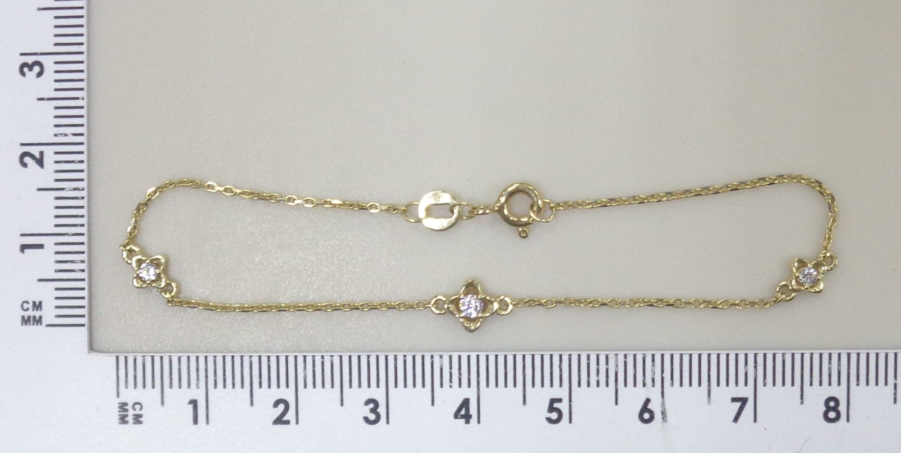 Золотой браслет 585 пробы; желтое золото; плетение Якорное; вставки 3 Фианит бесцв.;